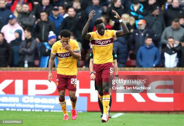 Bevis Mugabi of Motherwell celebrates after scoring their side's first goal during the Cinch Scottish Premiership match between Motherwell FC and...