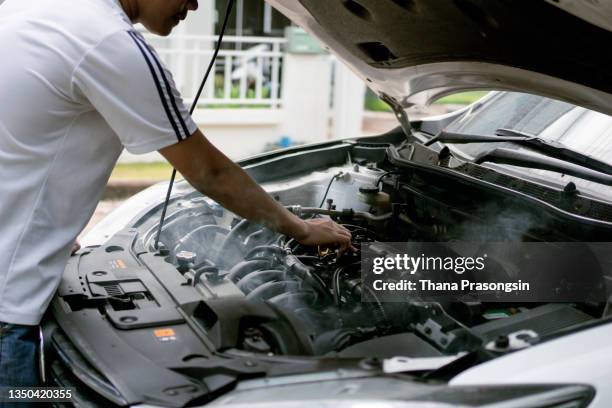 young man had a car breakdown - engine failure stock pictures, royalty-free photos & images