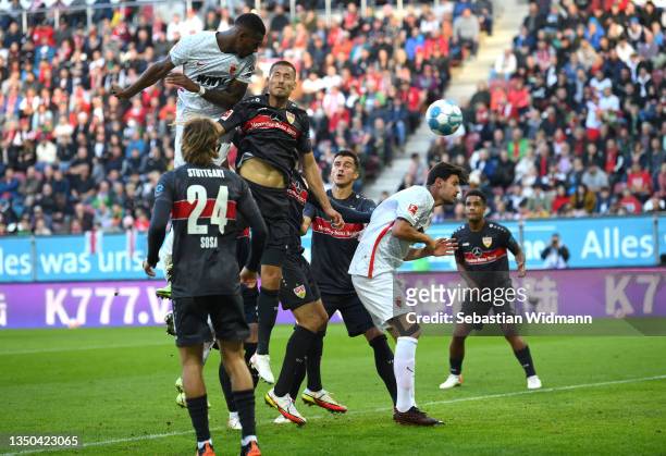 Reece Oxford of FC Augsburg scores their side's first goal during the Bundesliga match between FC Augsburg and VfB Stuttgart at WWK-Arena on October...