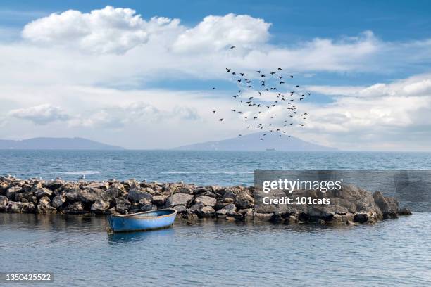 small craft on the sea - minirock stock pictures, royalty-free photos & images