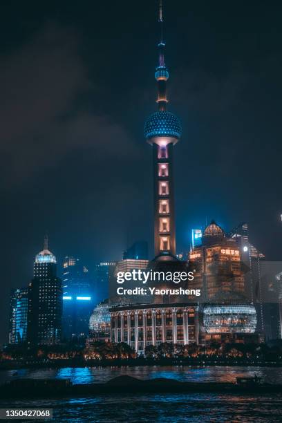 shanghai in holiday night,light show of shanghai city in national holiday festival - light show in shanghai stockfoto's en -beelden