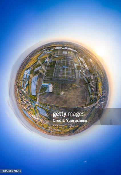 360 degree planet view of a super high voltage transformer substation - 360 globe stockfoto's en -beelden