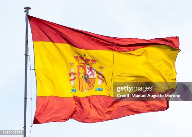 waving flag of spain - spanish flag stock pictures, royalty-free photos & images