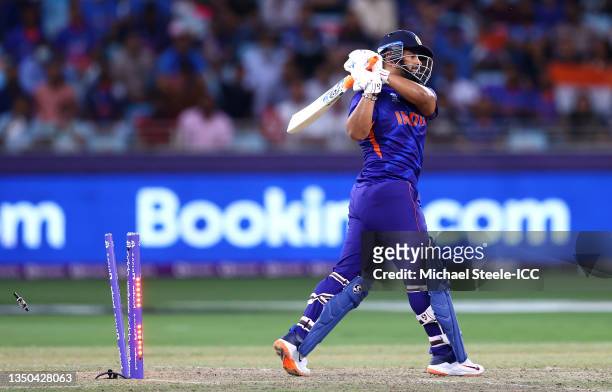Rishabh Pant of India is bowled out by Adam Milne of New Zealand during the ICC Men's T20 World Cup match between India and NZ at Dubai International...