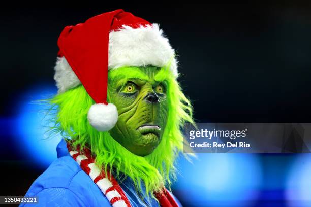 Detroit Lions fan dressed as the grinch in the stands before the game against the Philadelphia Eagles at Ford Field on October 31, 2021 in Detroit,...