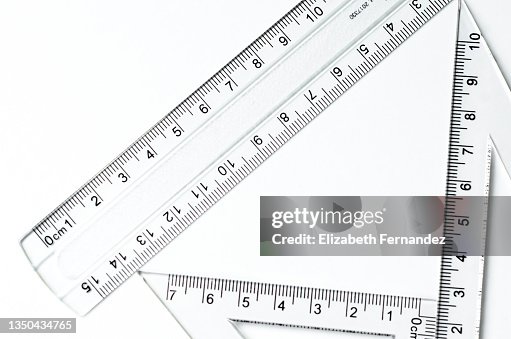 Various rulers of different shapes on white background Various rulers of different shapes on white background