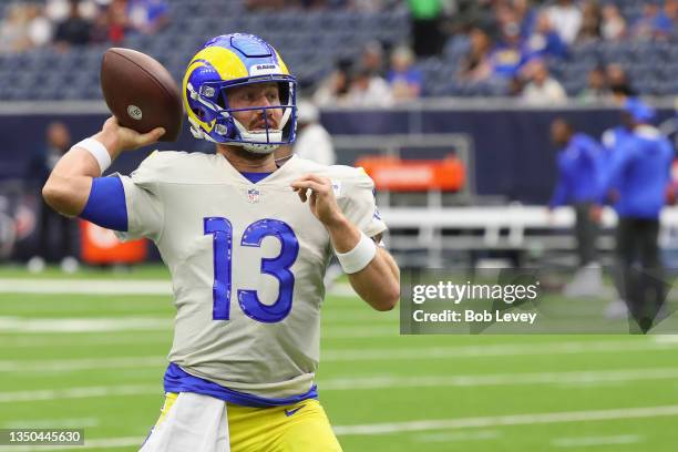 John Wolford of the Los Angeles Rams throws the ball during pregame warm-ups before the game against the Houston Texans at NRG Stadium on October 31,...