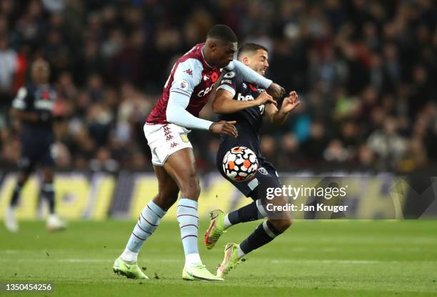 Kortney Hause of Aston Villa challenges Pablo Fornals of West Ham United during the Premier League match between Aston Villa and West Ham United at...