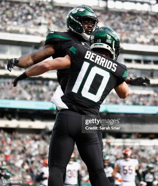 Braxton Berrios of the New York Jets celebrates with Denzel Mims after a touchdown during the second quarter against the Cincinnati Bengals at...