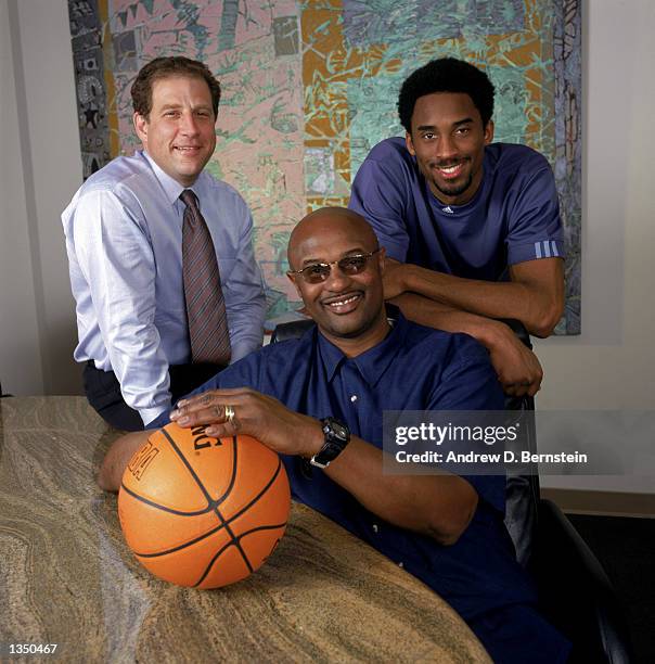 Agent Arn Tellem poses for a portrait with client guard Kobe Bryant of the Los Angeles Lakers and Bryant's father, former NBA player Joe "Jellybean"...