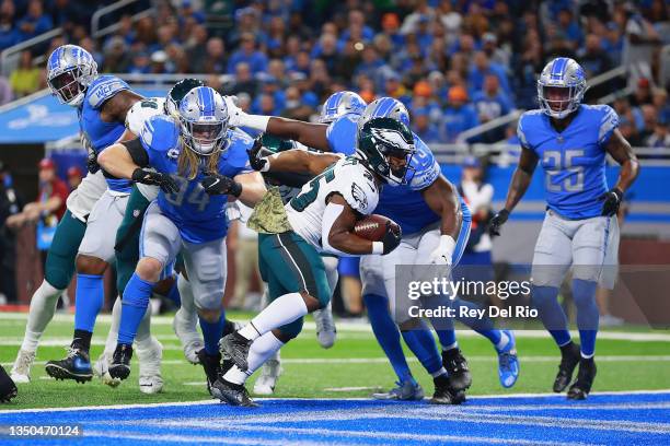 Boston Scott of the Philadelphia Eagles scores a touchdown during the first quarter against the Detroit Lions at Ford Field on October 31, 2021 in...