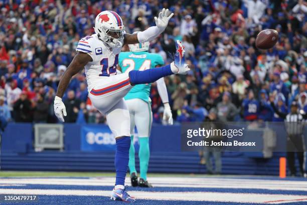 Stefon Diggs of the Buffalo Bills celebrates after scoring a touchdown in the fourth quarter against the Miami Dolphins at Highmark Stadium on...