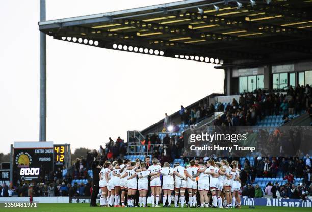 Players of England Red Roses huddle following the Autumn International match between England Red Roses and New Zealand Women at Sandy Park on October...
