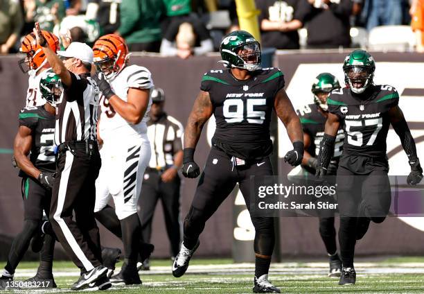 Quinnen Williams of the New York Jets reacts after sacking Joe Burrow of the Cincinnati Bengals during the first quarter at MetLife Stadium on...