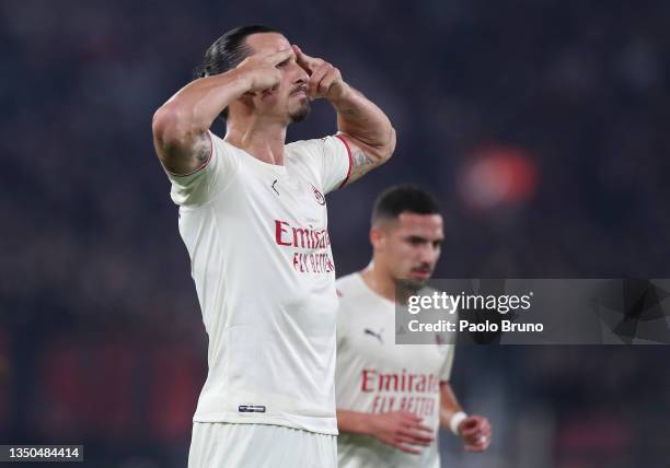 Zlatan Ibrahimovic of AC Milan celebrates after scoring their side's first goal during the Serie A match between AS Roma and AC Milan at Stadio...