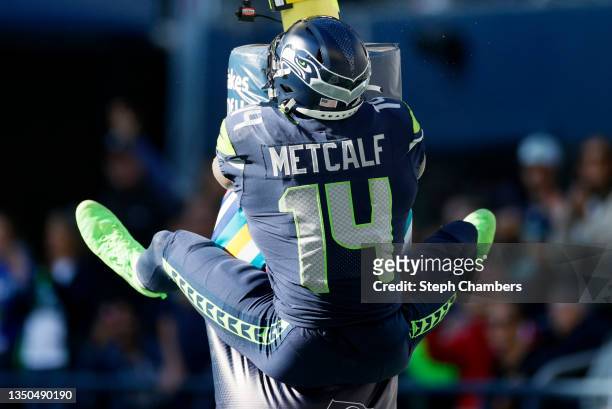 DK Metcalf of the Seattle Seahawks celebrates his touchdown by