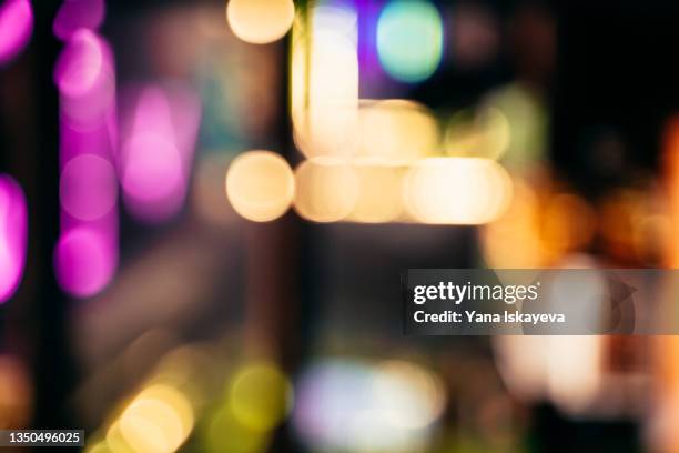 abstract defocused background of restaurant or casino neon lights indoors - casino interior fotografías e imágenes de stock