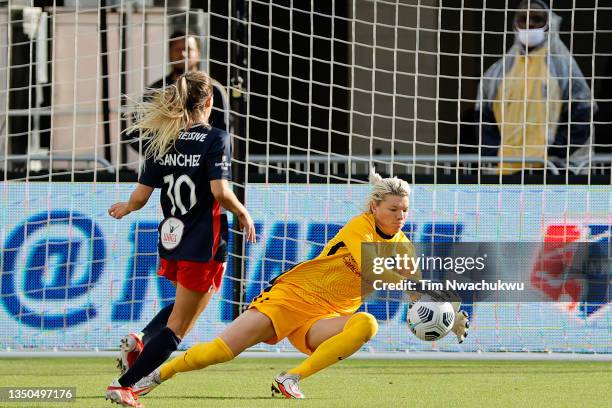 Jane Campbell of Houston Dash reaches for a save during the second half against the Washington Spirit at Audi Field on October 31, 2021 in...