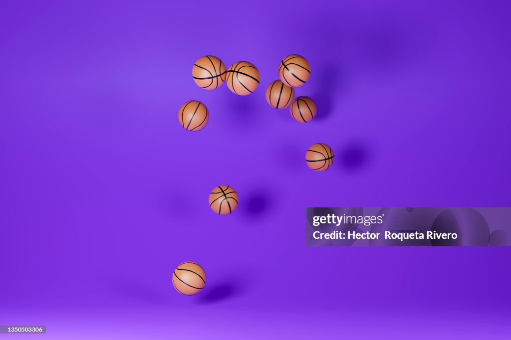 Computer generated image of many Basketballs on purple background, sport concept