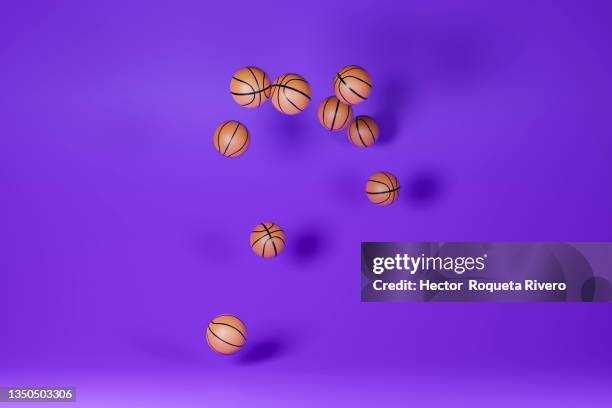computer generated image of many basketballs on purple background, sport concept - はずむ ストックフォトと画像