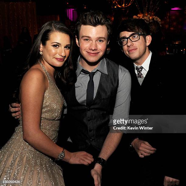 Actors Lea Michele, Chris Colfer and Kevin McHale pose at the after party for the premiere of Warner Bros. Pictures' "New Year's Eve" at Hollywood...