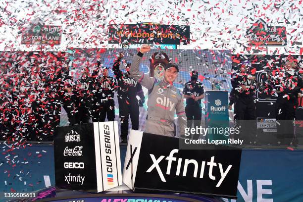 Alex Bowman, driver of the Ally Chevrolet, celebrates in the Ruoff Mortgage victory lane after winning the NASCAR Cup Series Xfinity 500 at...