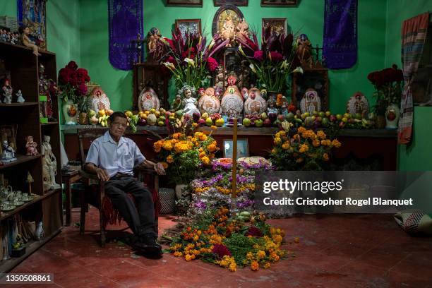 Portrait of Epifanio Luis Perez on the altar of the dead inside his house ahead of Day of the Dead at Mitla on October 31, 2021 in Mitla, Mexico.