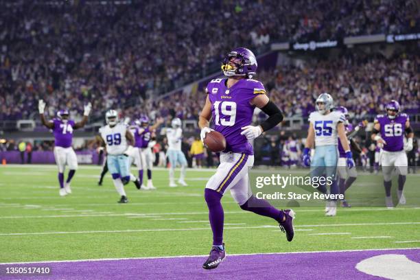 Adam Thielen of the Minnesota Vikings celebrates after a 20-yard touchdown pass from Kirk Cousins against the Dallas Cowboys during the first quarter...