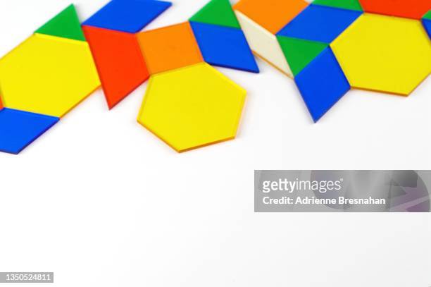 colorful geometric shapes - tangram stock-fotos und bilder