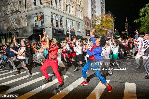 Members of Thriller NYC dance to Michael Jackson's "Thriller" during the New York City’s 48th Annual Village Halloween Parade on October 31, 2021 in...