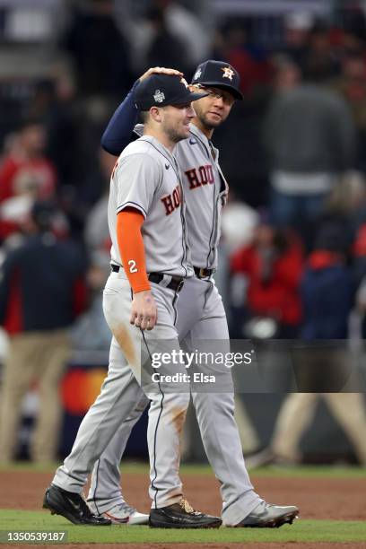 Alex Bregman and Yuli Gurriel of the Houston Astros celebrate the team's 9-5 win against the Atlanta Braves in Game Five of the World Series at...