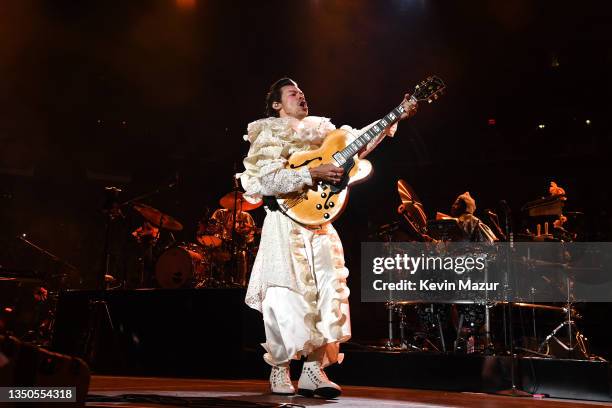 Harry Styles performs onstage during "Harryween" Fancy Dress Party at Madison Square Garden on October 31, 2021 in New York City.