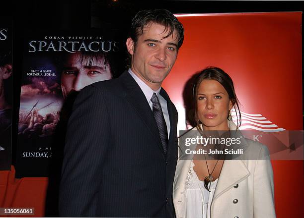 Goran Visnjic and Rhona Mitra during USA Network's "Spartacus" World Premiere - Red Carpet Arrivals at Director's Guild of America in Los Angeles,...