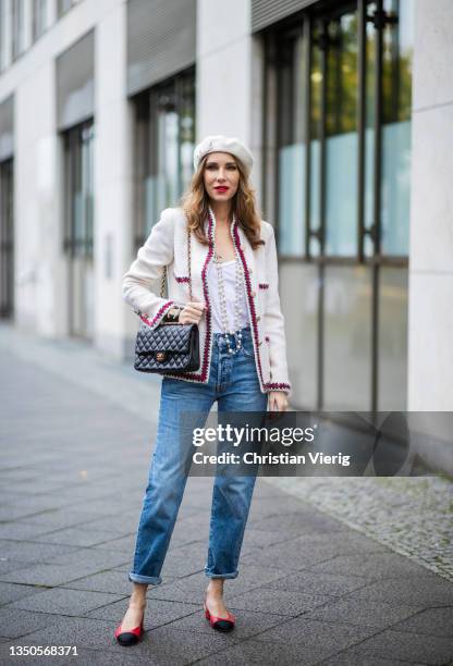 Alexandra Lapp is seen wearing Jeans - Hiker Hover high waist, straight leg Jeans from Mother, Bag - Vintage Classic Chanel Flap-Bag ’The Chanel...