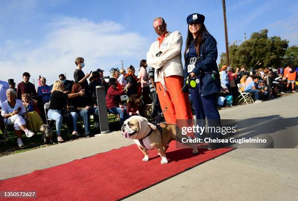 Participants dressed as Hannibal Lecter and characters from "The Silence of the Lambs" are seen at the Haute Dog Howl'oween Parade at Marina Vista...