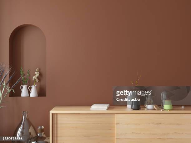 modern console with empty wall and accessories - brown wood stock pictures, royalty-free photos & images