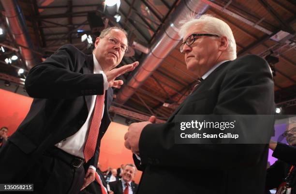 Peer Steinbrueck and Frank-Walter Steinmeier, both leading members of the German Social Democrats , arrive on the third day of the SPD annual federal...