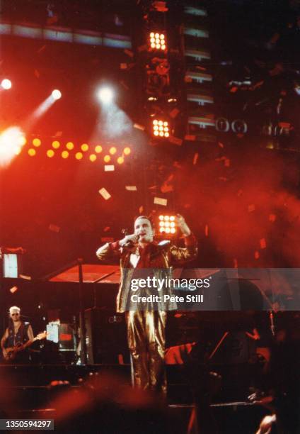 Singer Bono of Irish rock group U2 dressed as the Mr MacPhisto character wearing devil horns, performs on stage at Wembley Stadium on the band's...