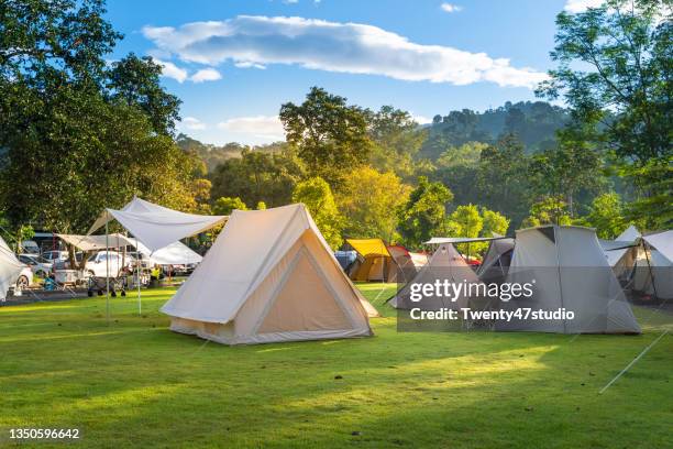 camping tents in campsite - camping de lujo fotografías e imágenes de stock