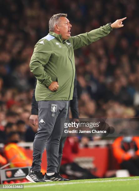 Craig Shakespeare, Assistant Manager of Aston Villa gives their team instructions during the Premier League match between Arsenal and Aston Villa at...