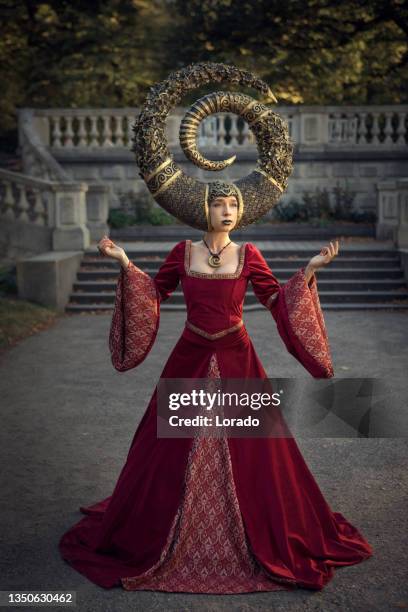 beautiful fantasy woman in a luxury public garden - the fairy queen stock pictures, royalty-free photos & images