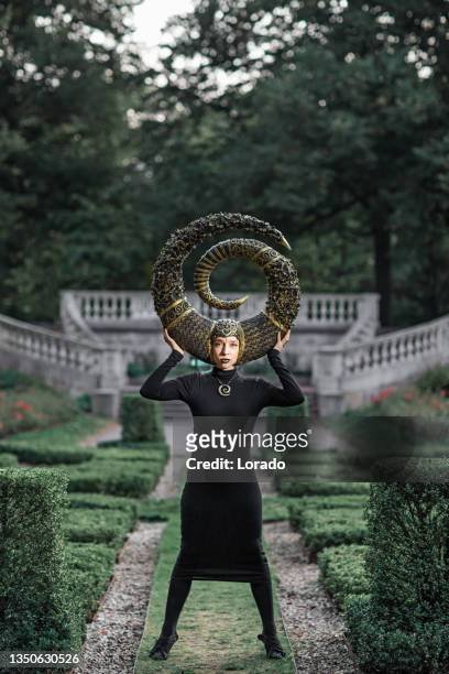 beautiful fantasy woman in a luxury public garden - the fairy queen stock pictures, royalty-free photos & images