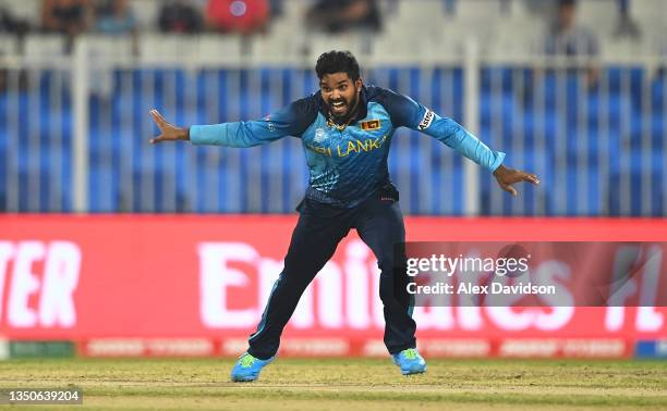 Wanindu Hasaranga of Sri Lanka celebrates the wicket of Jonny Bairstow of England during the ICC Men's T20 World Cup match between England and Sri...