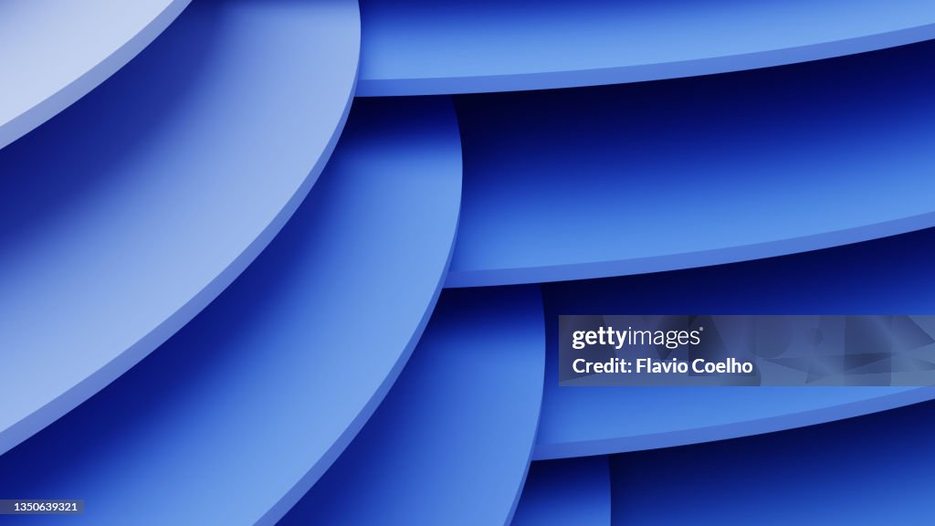 3D rendering of matte blue discs layers stacked filling the frame