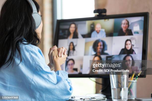 multi-ethnic group attends virtual employee engagement meeting - virtual employee engagement stock pictures, royalty-free photos & images