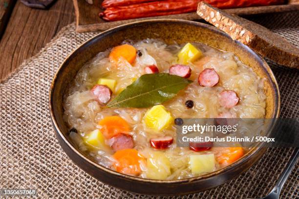 high angle view of soup in bowl on table - gemüse grün stock pictures, royalty-free photos & images