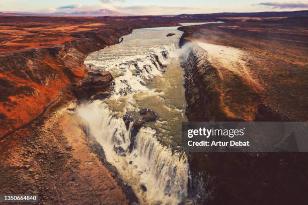 dramatic drone view of the gullfoss waterfall in iceland. - gullfoss falls stock pictures, royalty-free photos & images