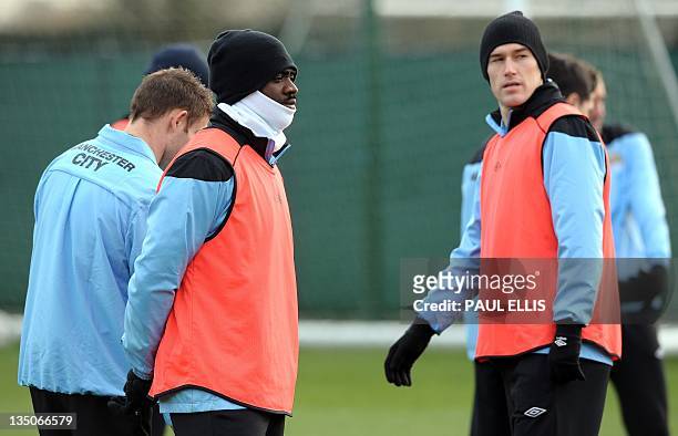 Manchester City's Ivorian defender Kolo Toure takes part in a training session in Manchester on December 6, 2011 on the eve of their UEFA Champions...