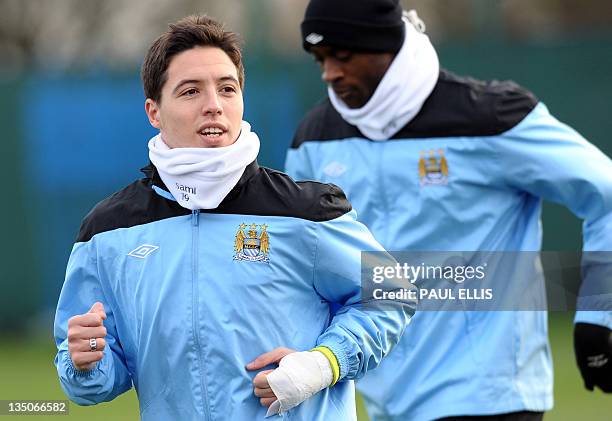 Manchester City's French midfielder Samir Nasri takes part in a training session in Manchester on December 6, 2011 on the eve of their UEFA Champions...