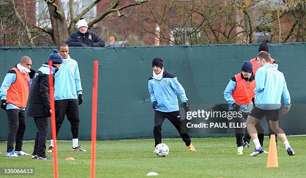 Manchester City's Bosnian forward Edin Dzeko takes part in a training session in Manchester on December 6, 2011 on the eve of their UEFA Champions...